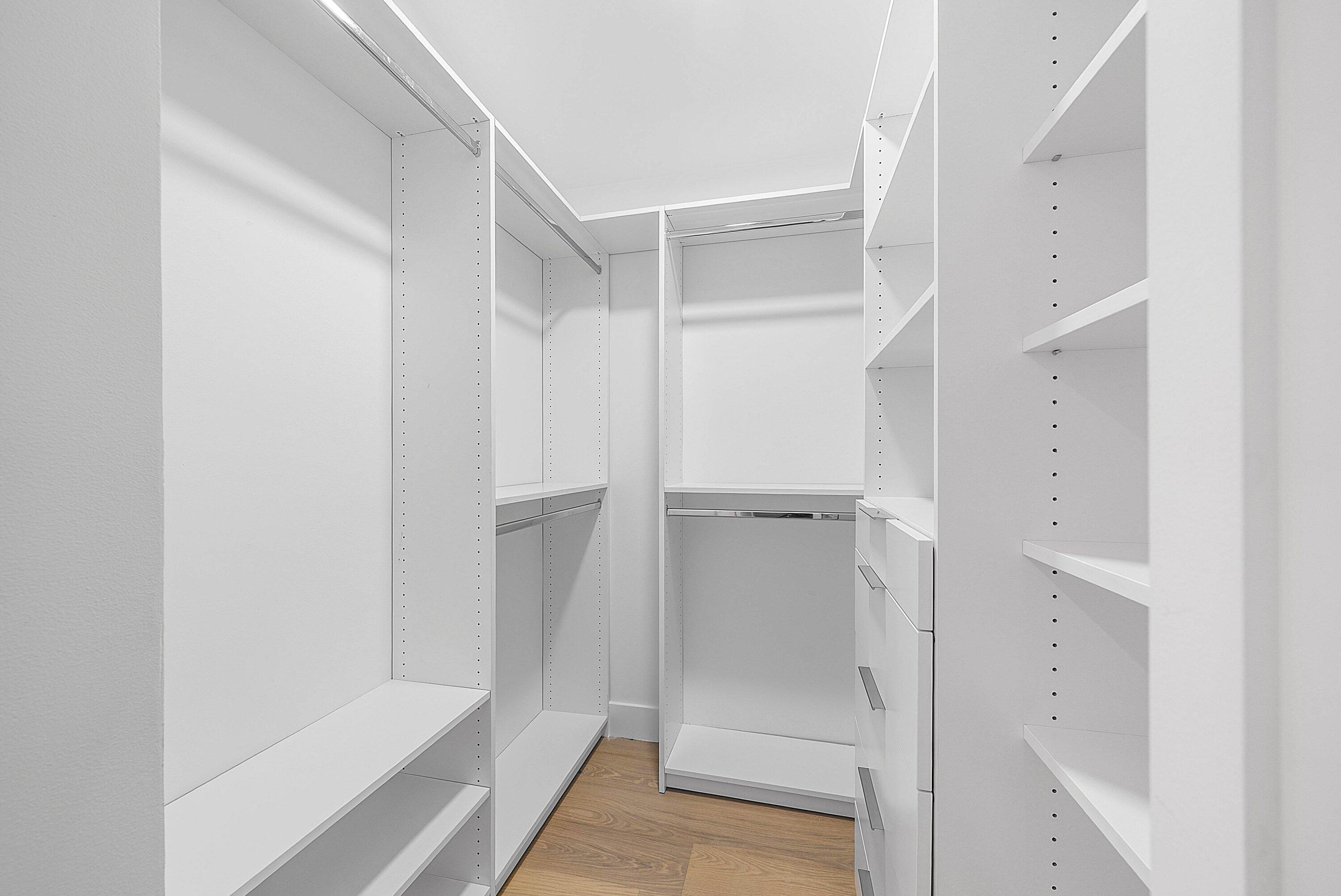 5723 Aspen Ridge Circle Delray Beach, FL 33484 - Photo 25 of 47 a bathroom with a glass shower door