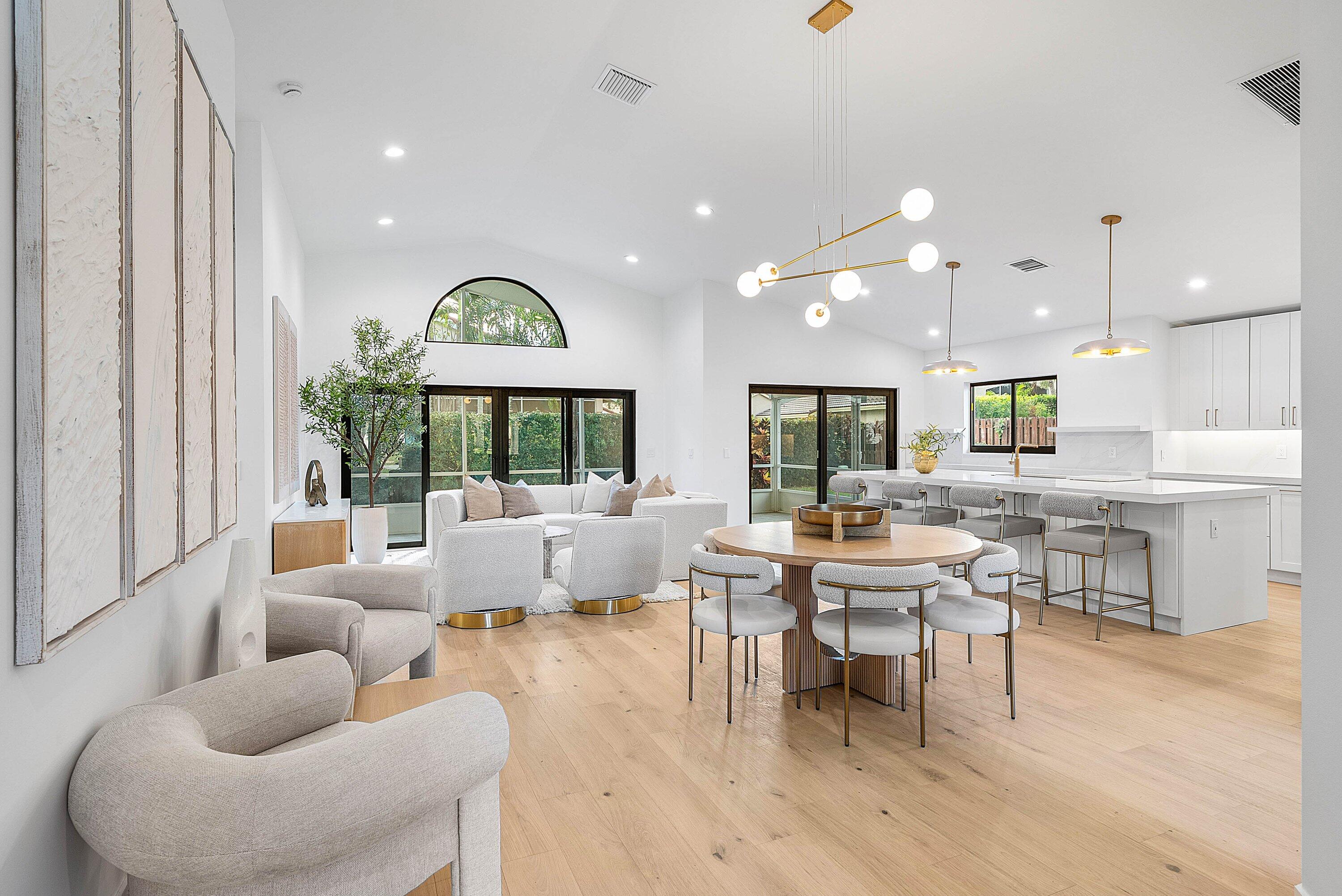 5723 Aspen Ridge Circle Delray Beach, FL 33484 - Photo 29 of 47 a living room with furniture and a large window