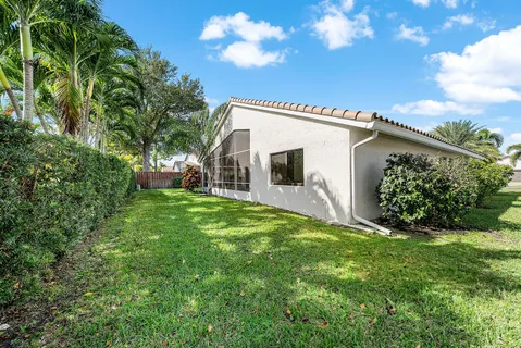 a view of a garden with a patio