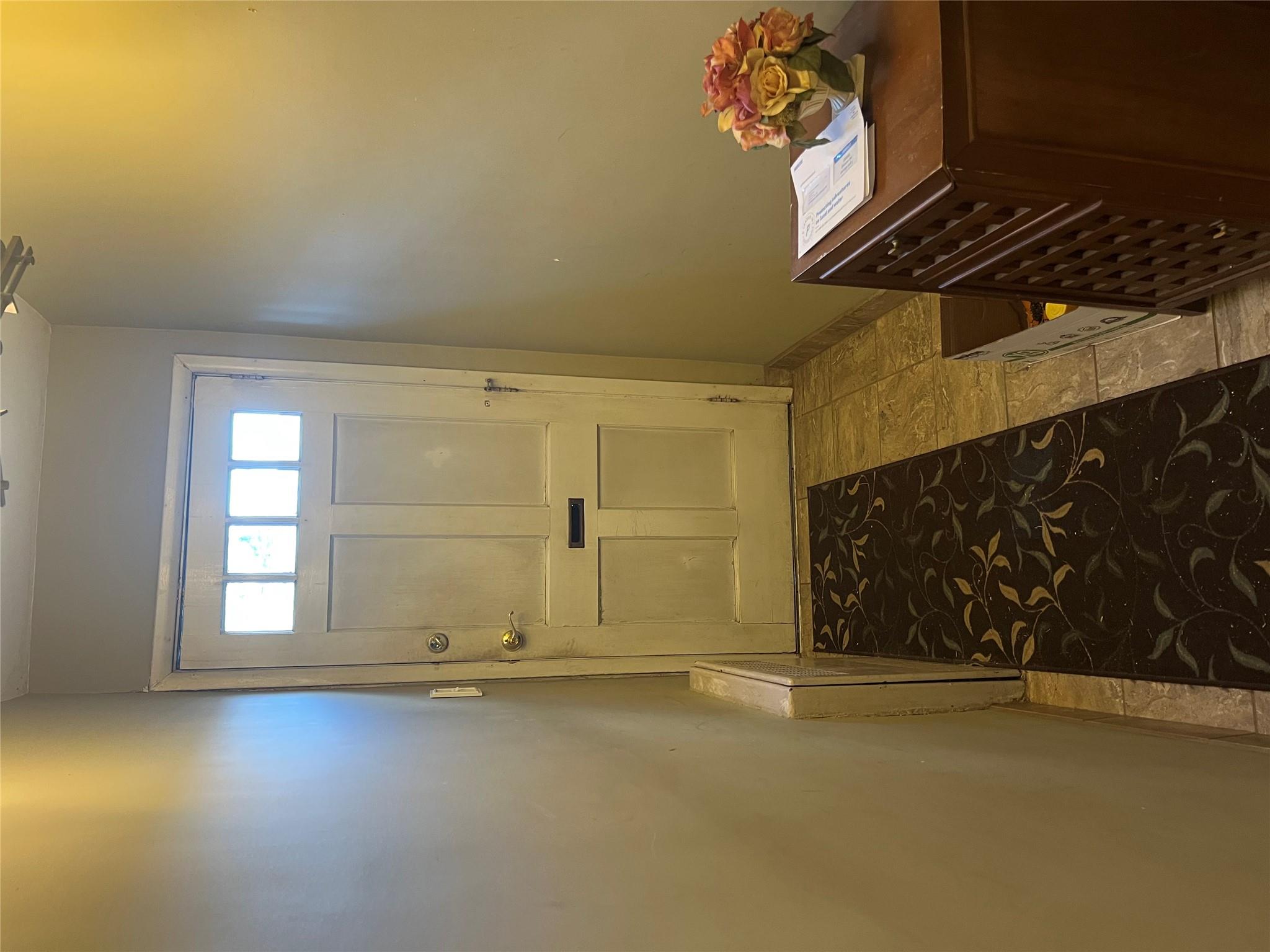 41-20 210th Street, Unit 1 Queens, NY 11361 - Photo 3 of 17 Doorway featuring baseboards and radiator