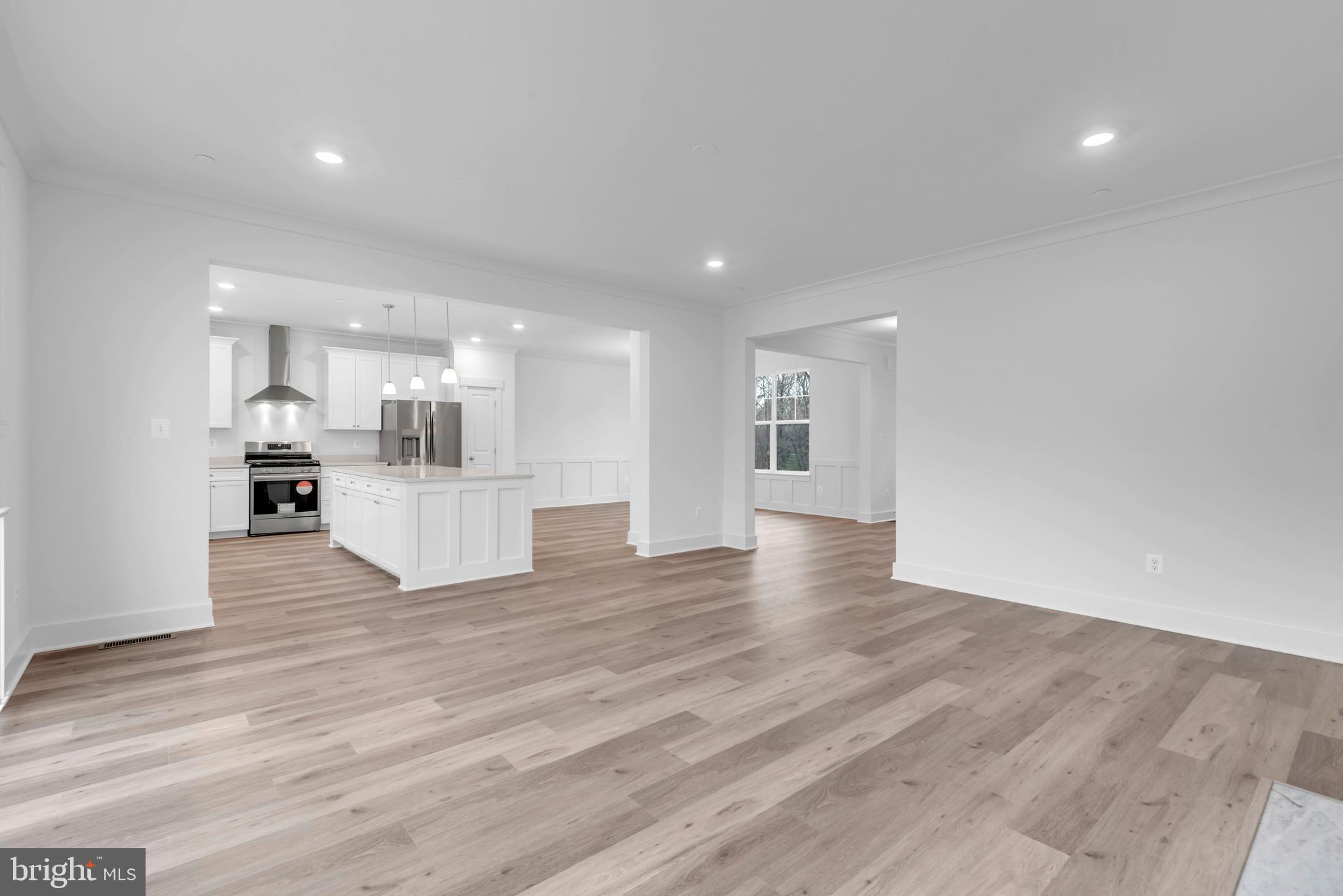 6502 Whitetail Xing Way Hanover, MD 21076 - Photo 17 of 54 a view of kitchen and hall with wooden floor