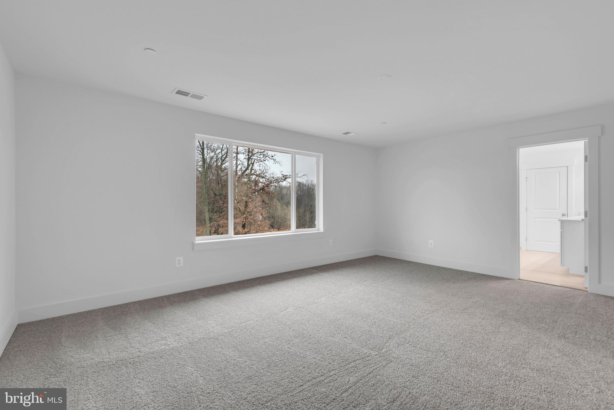 6502 Whitetail Xing Way Hanover, MD 21076 - Photo 29 of 54 an empty room with windows