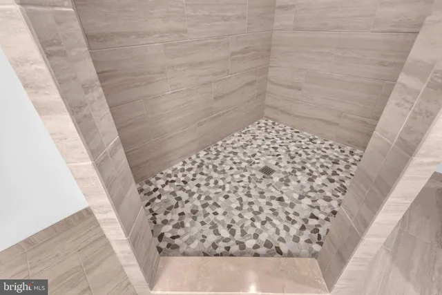 a bathroom with a shower curtain