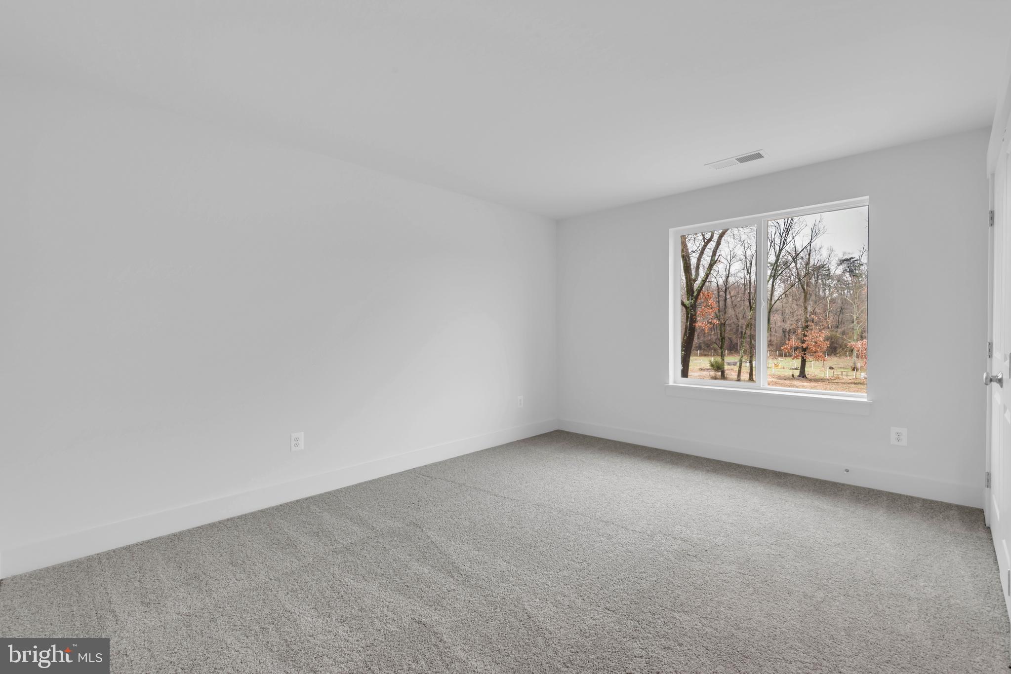 6502 Whitetail Xing Way Hanover, MD 21076 - Photo 36 of 54 an empty room with windows
