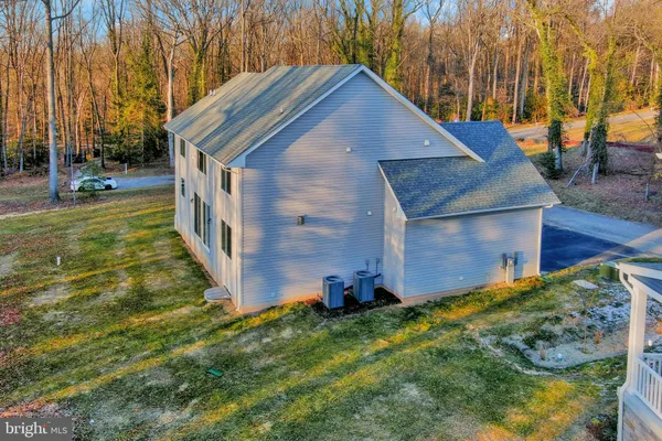 a view of a backyard of the house