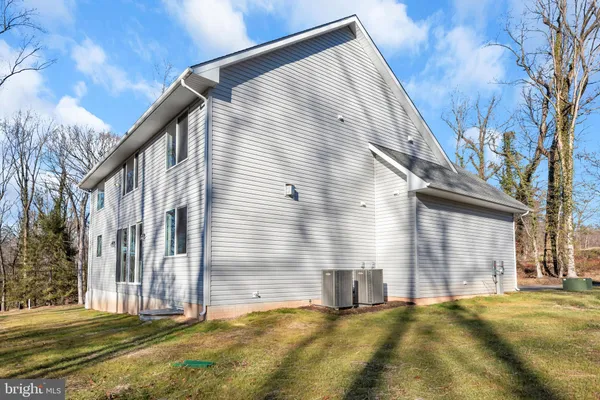 a view of a yard with trees