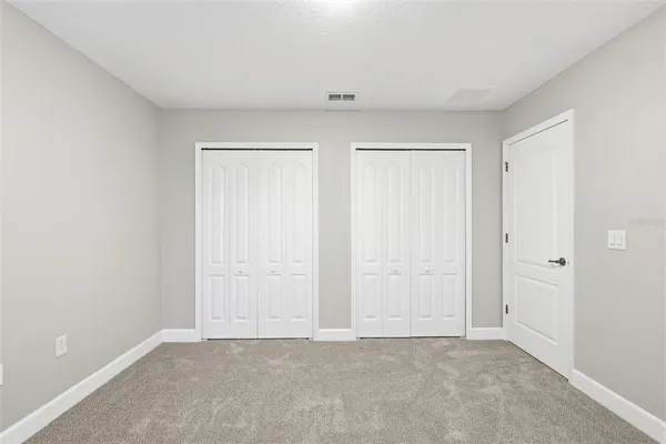 a view of entryway with livingroom