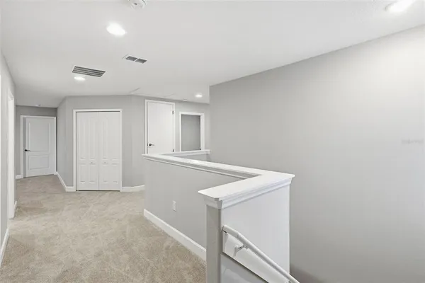 a view of a dining room with furniture and window