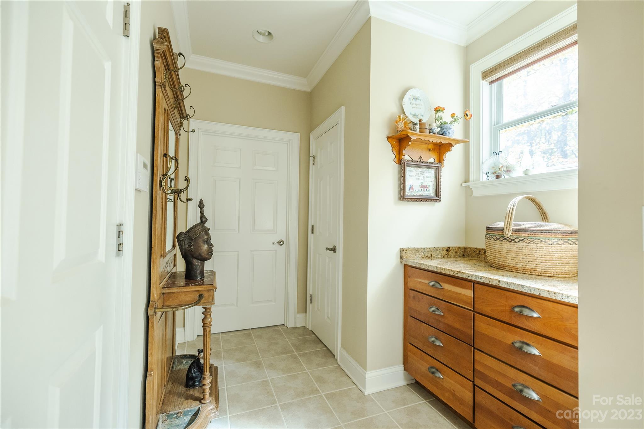 41 Silk Tree Road Hendersonville, NC 28739 - Photo 11 of 32 a room that has a dresser and a window in it