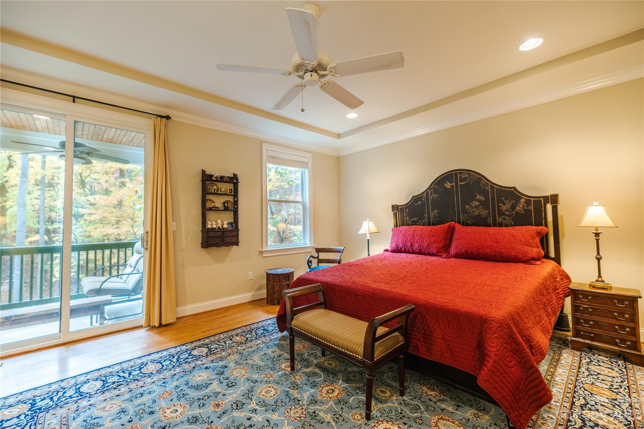 41 Silk Tree Road Hendersonville, NC 28739 - Photo 13 of 32 a bedroom with a bed and wooden floor