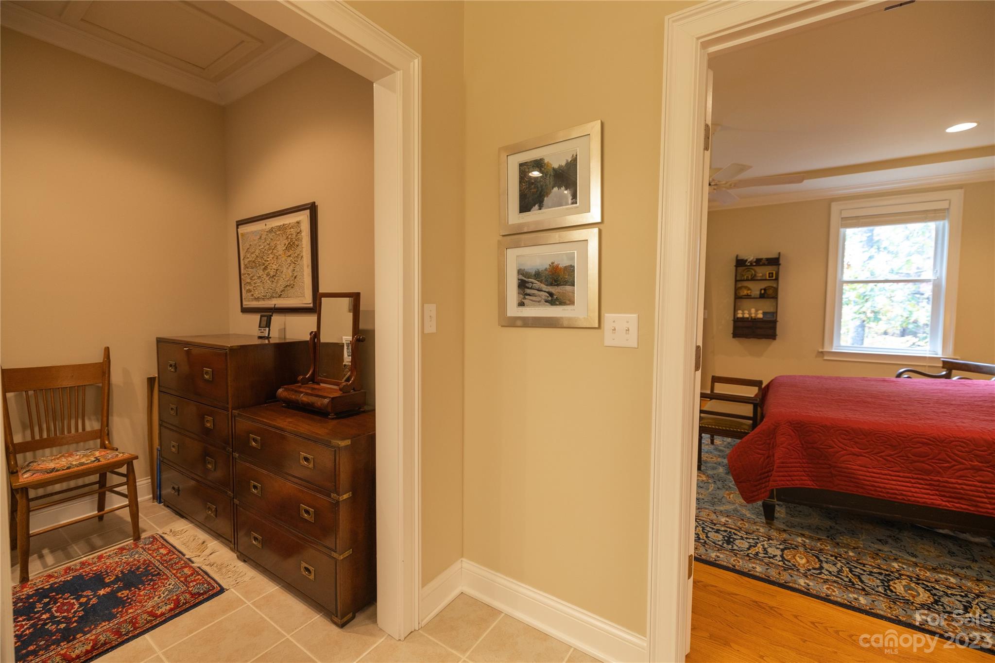 41 Silk Tree Road Hendersonville, NC 28739 - Photo 17 of 32 a bedroom with a bed and wooden floor