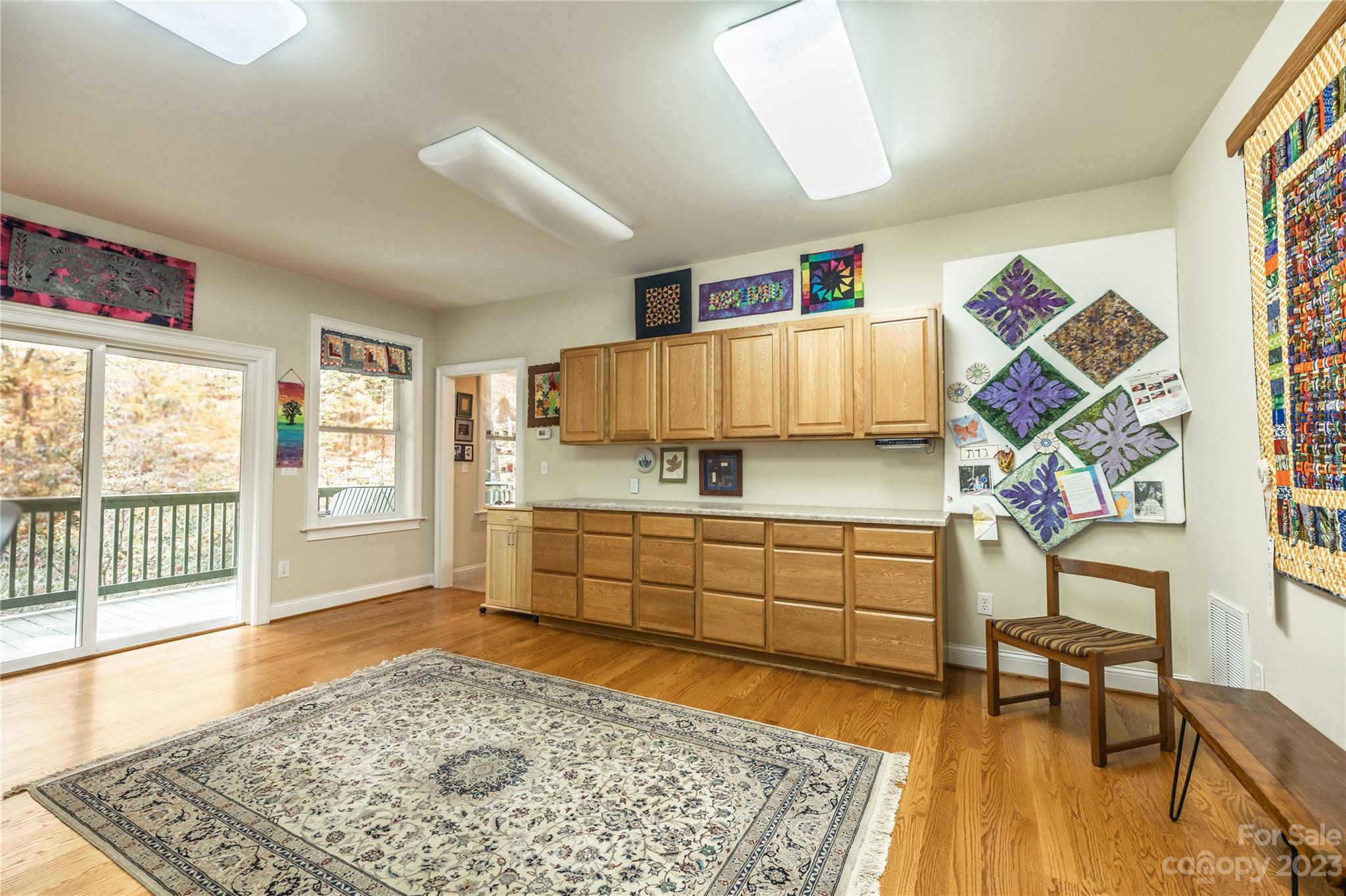 41 Silk Tree Road Hendersonville, NC 28739 - Photo 21 of 32 a bed room with a bed and table