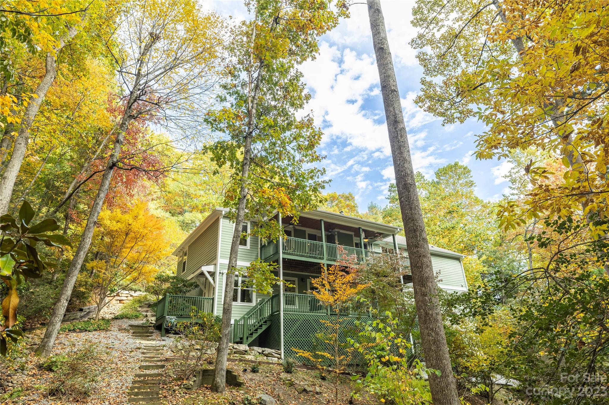 41 Silk Tree Road Hendersonville, NC 28739 - Photo 29 of 32 a view of a house with a tree