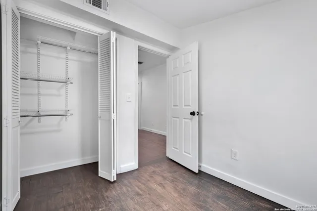 an empty room with closet