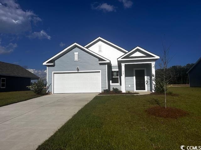 219 Linares Street Loris, SC 29569 - Photo 1 of 10 View of front of house featuring a front lawn and