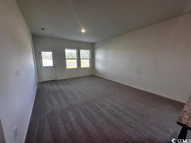 219 Linares Street Loris, SC 29569 - Photo 7 of 10 View of carpeted spare room