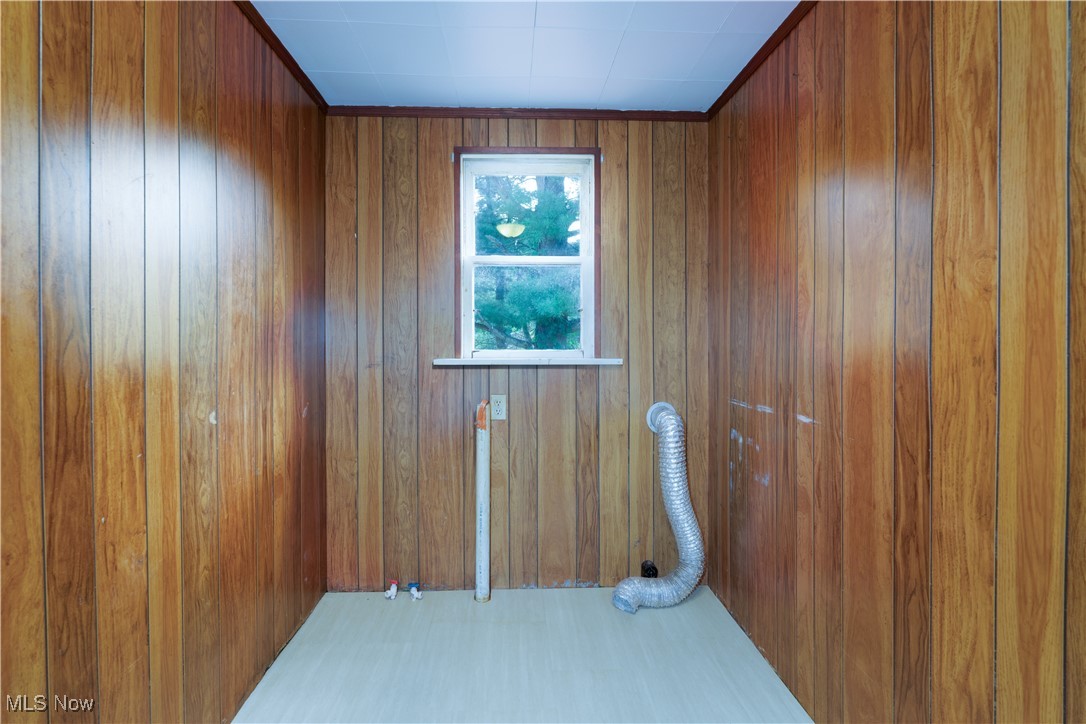 4491 Fox Road Kingsville, OH 44048 - Photo 13 of 33 Spare room with wood walls
