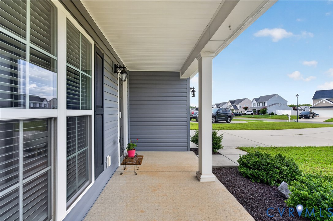 311 Cardinal Road Louisa, VA 23093 - Photo 4 of 39 Covered front porch featuring a concrete surface a