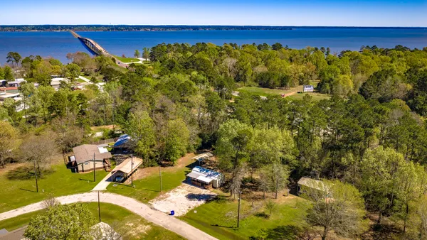 a view of a swimming pool with an outdoor space and seating area