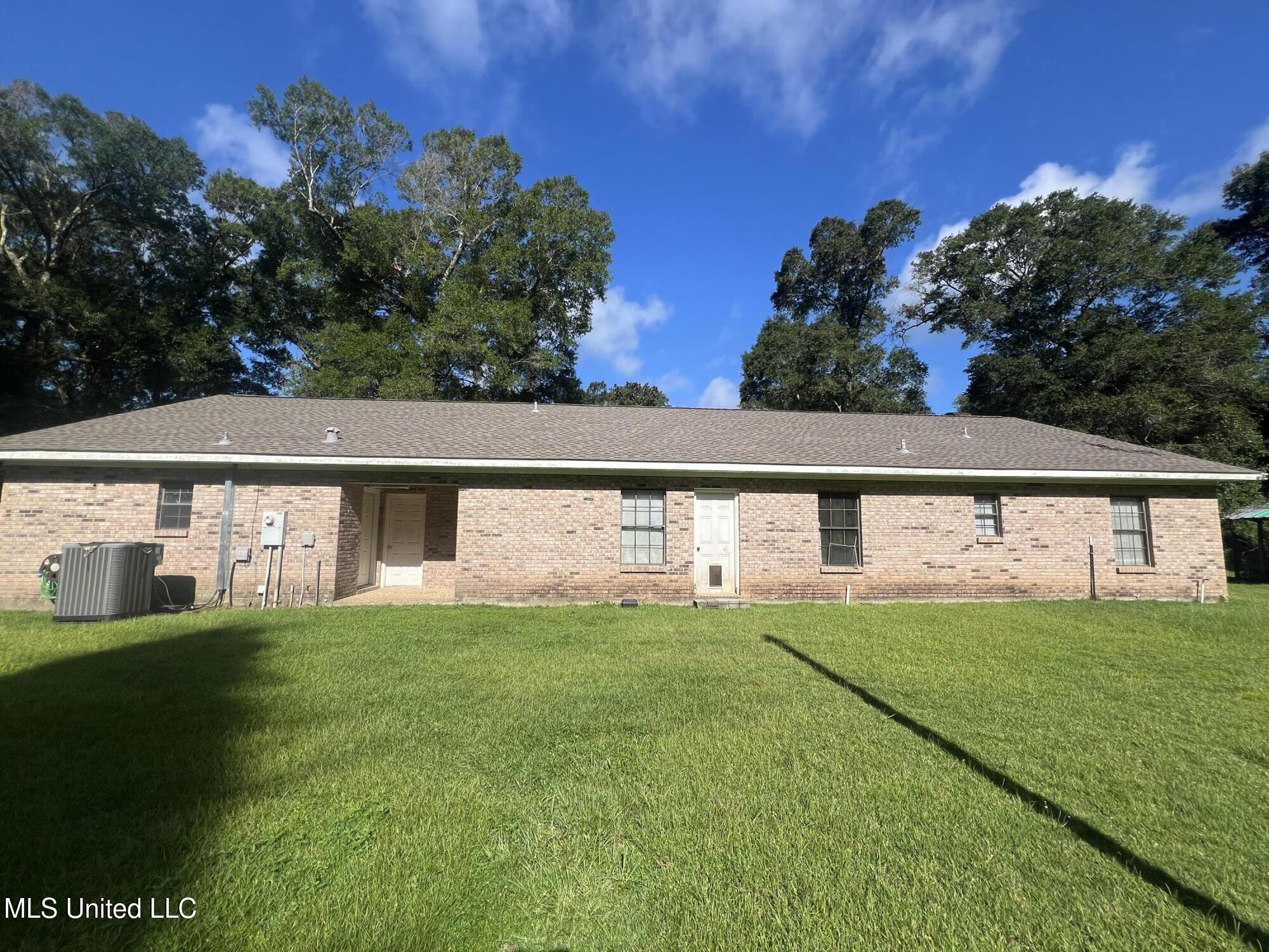 17116 Pierce Street Moss Point, MS 39562 - Photo 23 of 25 BACK OF HOUSE EXTERIOR_