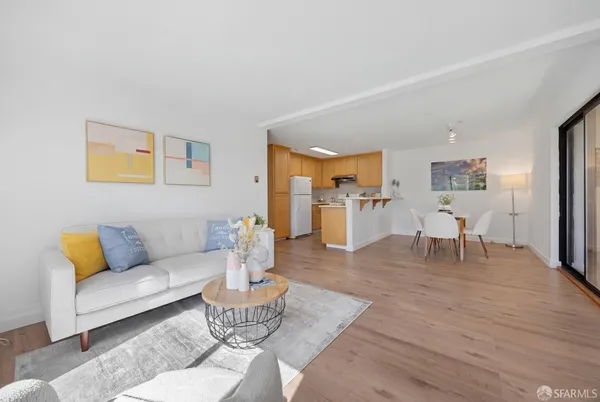 a living room with furniture and a table