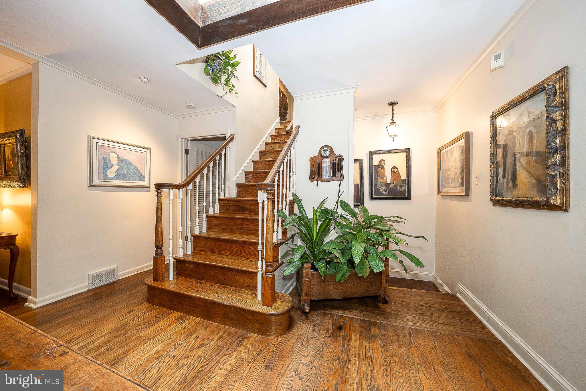 21 Weirwood Lane Wayne, PA 19087 - Photo 4 of 52 Foyer with Hardwood Floors and Stairs to 2nd Floor