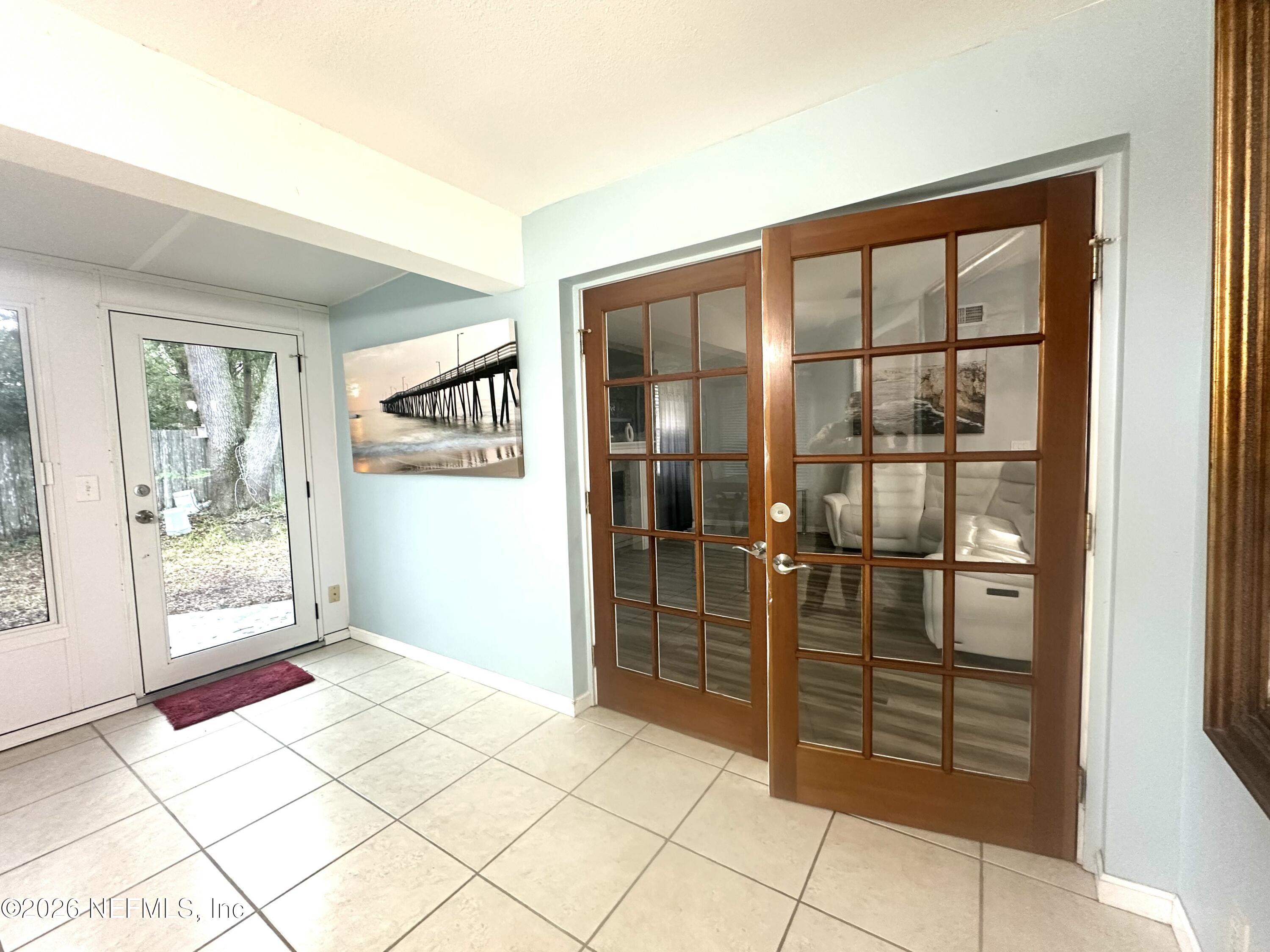 1516 Derringer Road Jacksonville, FL 32225 - Photo 28 of 55 a view of a entryway door of the house