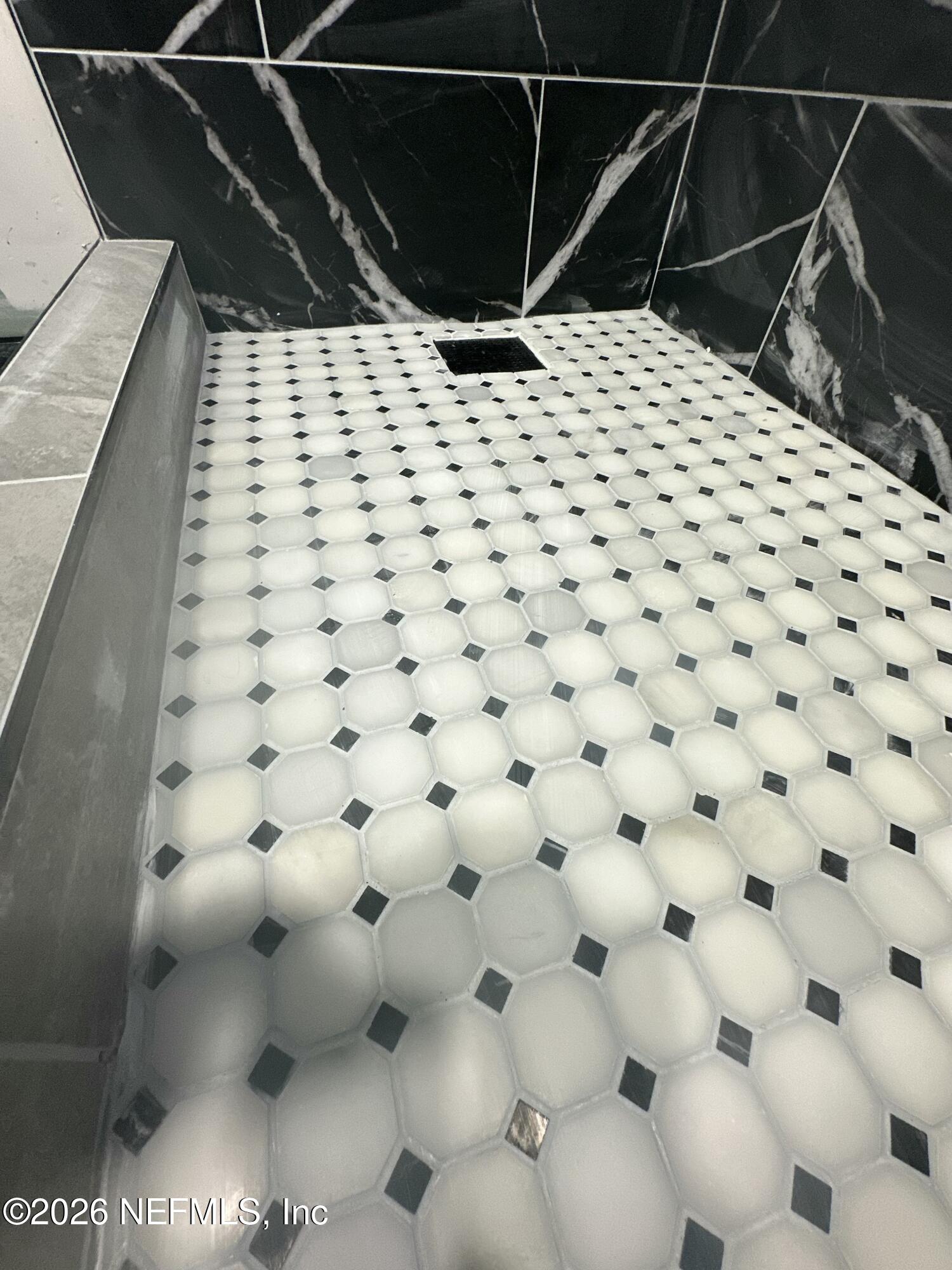 1516 Derringer Road Jacksonville, FL 32225 - Photo 38 of 55 a bathroom with a sink a toilet and a mirror