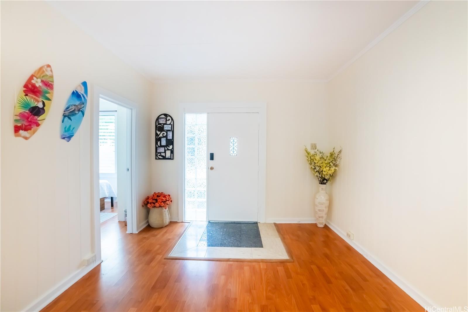 303 Wai Nani Way Honolulu, HI 96815 - Photo 11 of 24 a view of an entryway with wooden floor