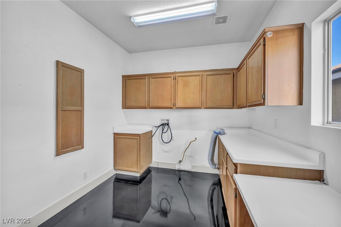 7308 Alpine Ridge Street Las Vegas, NV 89131 - Photo 25 of 47 Laundry area featuring hookup for a washing machine and visible vents