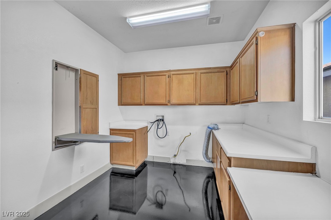 7308 Alpine Ridge Street Las Vegas, NV 89131 - Photo 26 of 47 Laundry room featuring hookup for a washing machine and visible vents