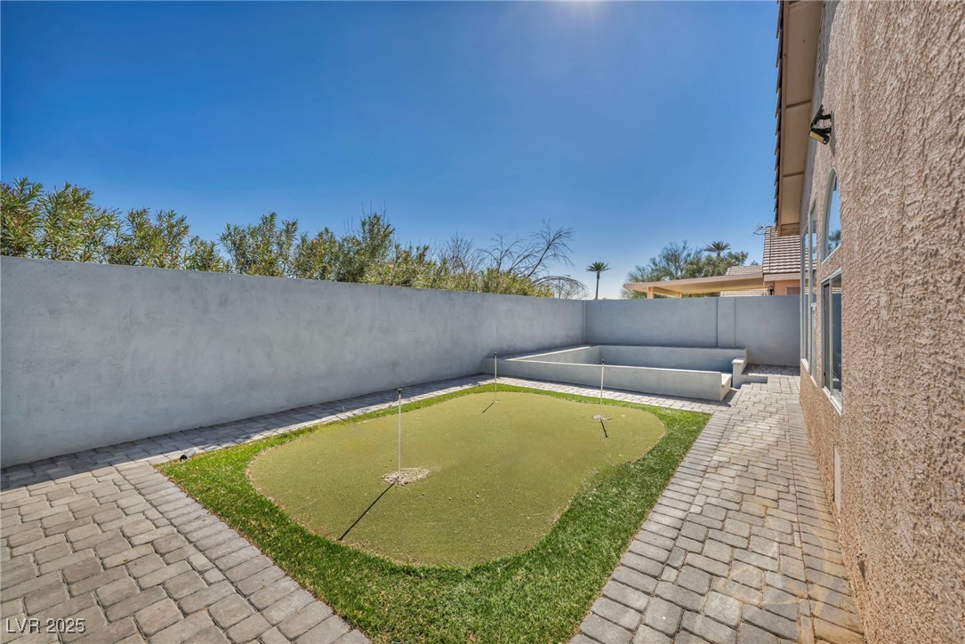 7308 Alpine Ridge Street Las Vegas, NV 89131 - Photo 45 of 47 View of yard with a fenced backyard