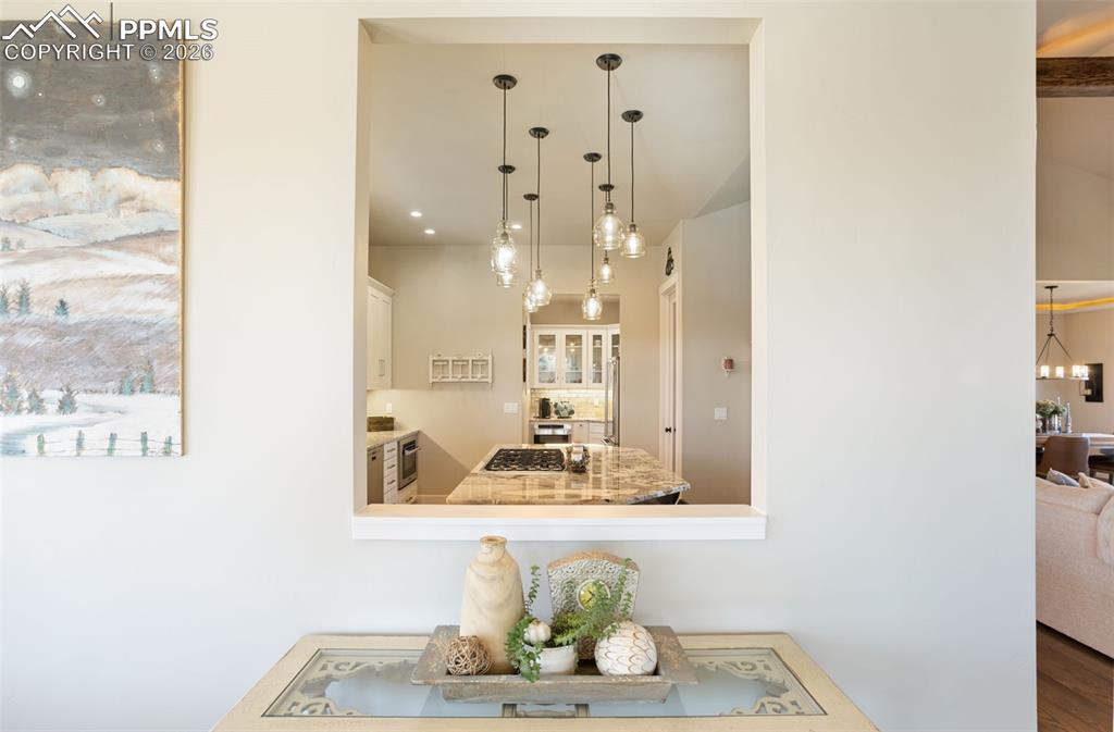 16835 Goshawk Road Colorado Springs, CO 80908 - Photo 4 of 50 a bathroom with a sink and a mirror