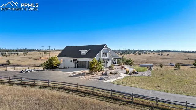 a view of a lake with a car parked