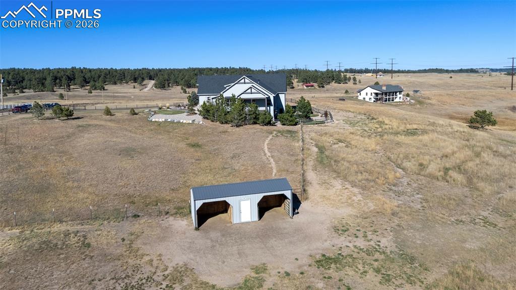 16835 Goshawk Road Colorado Springs, CO 80908 - Photo 46 of 50 a view of a road with an ocean view