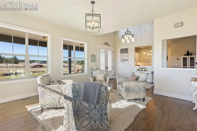 a living room with furniture and window