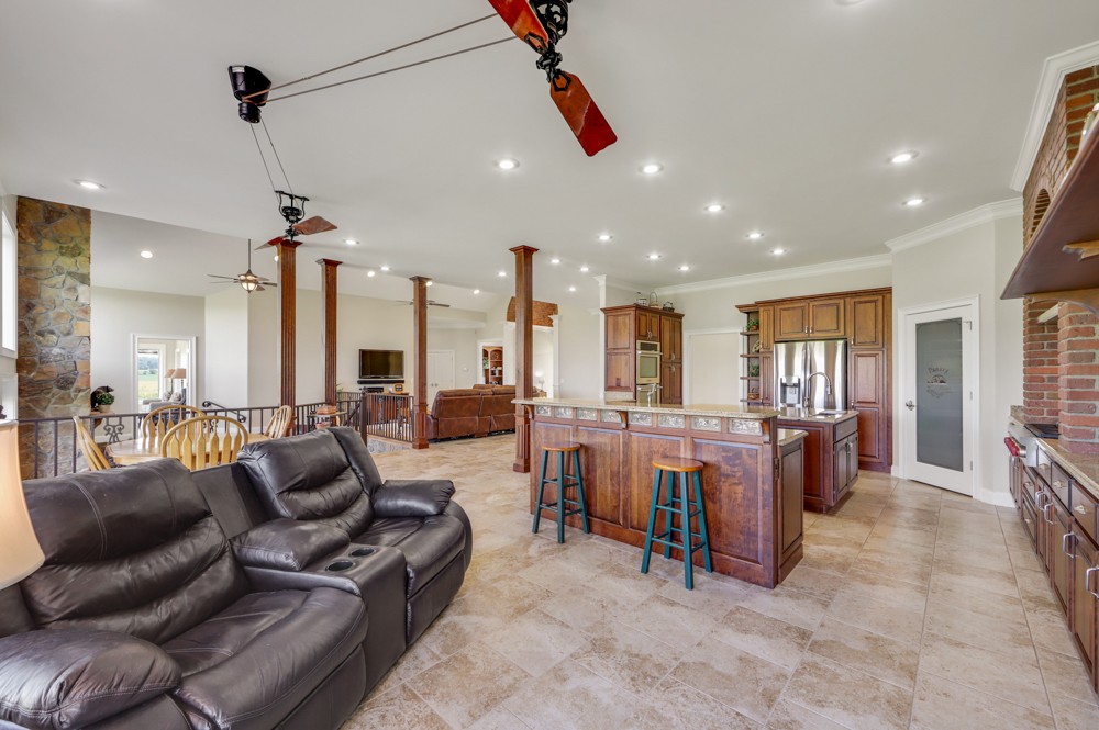 8007 Fountain Grove Road Morrison, TN 37357 - Photo 30 of 45 a living room with lots of furniture and kitchen view