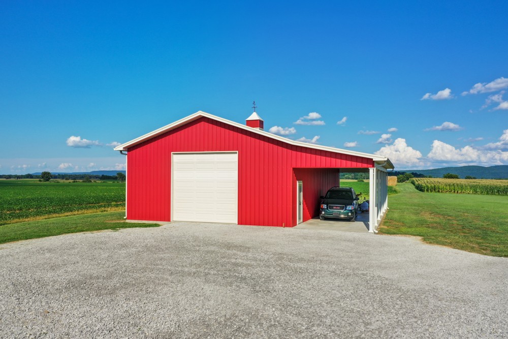 8007 Fountain Grove Road Morrison, TN 37357 - Photo 36 of 45 a view of a house with a yard and garage