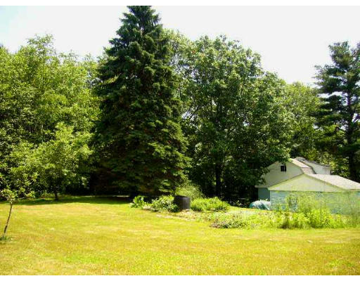 4 South Nelson Road Sterling, MA 01564 - Photo 11 of 21 a view of a swimming pool with an outdoor space and seating area