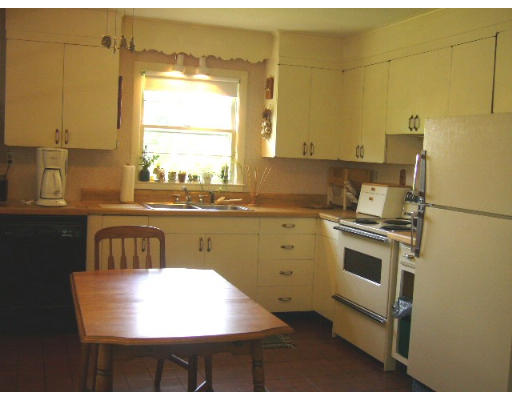 4 South Nelson Road Sterling, MA 01564 - Photo 3 of 21 a kitchen with a sink appliances cabinets and a large window