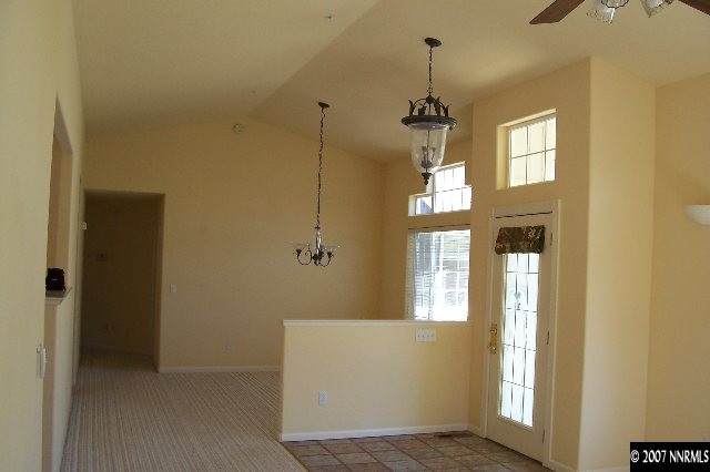 225 Koenig Road Reno, NV 89506 - Photo 2 of 9 a view of a hallway with windows