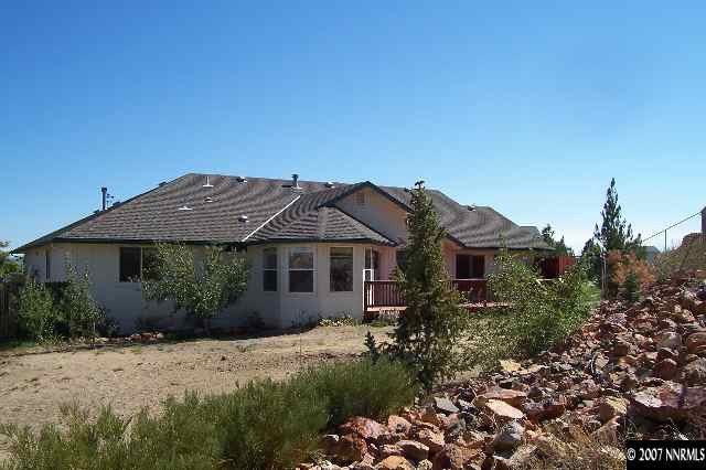 225 Koenig Road Reno, NV 89506 - Photo 8 of 9 a front view of a house with a garden
