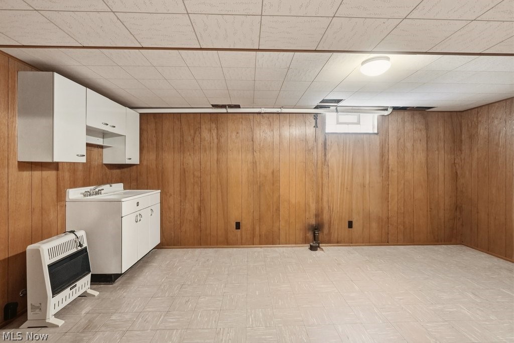 161 Pinehurst Road Munroe Falls, OH 44262 - Photo 29 of 40 Spacious lower level featuring wood paneling, drop ceiling with flush-mount lighting, and durable flooring