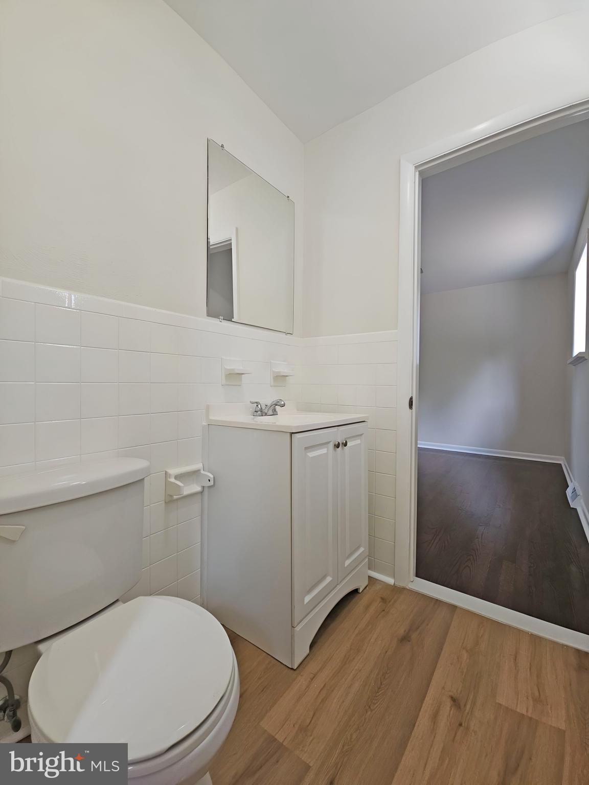 82 Harvard Road Pennsville, NJ 08070 - Photo 12 of 18 a bathroom with a toilet sink and shower