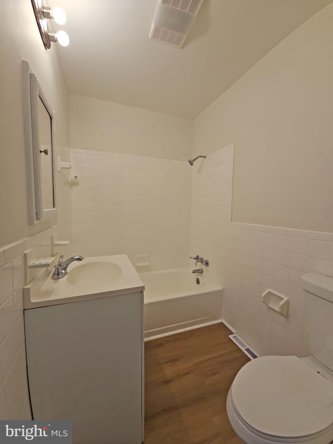 82 Harvard Road Pennsville, NJ 08070 - Photo 17 of 18 a bathroom with a sink a toilet and shower