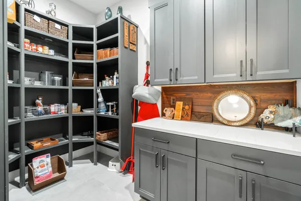 a view of wooden closet with racks