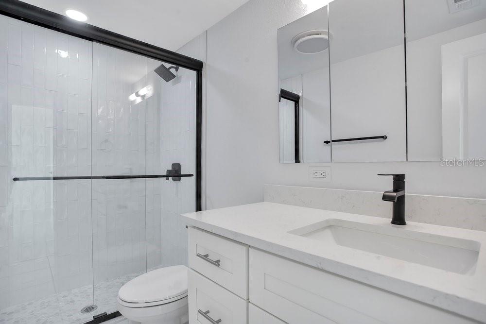 8911 Blind Pass Road, Unit 101 St. Pete Beach, FL 33706 - Photo 7 of 56