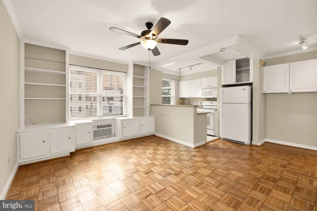 a view of an empty room with a window