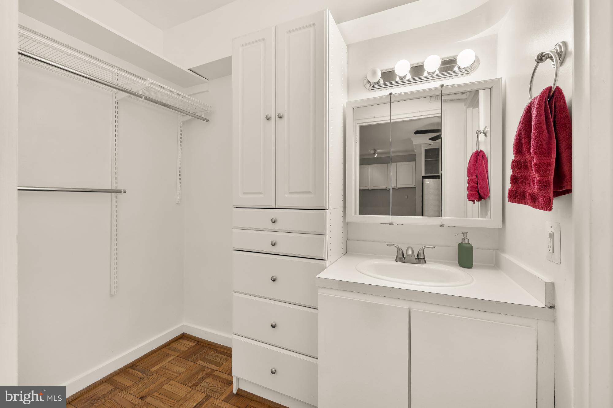 2130 N Street Northwest, Unit 407 Washington, DC 20037 - Photo 24 of 31 a bathroom with a sink vanity and a shower