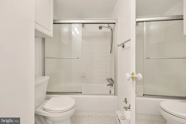 a group of people sitting in a living room